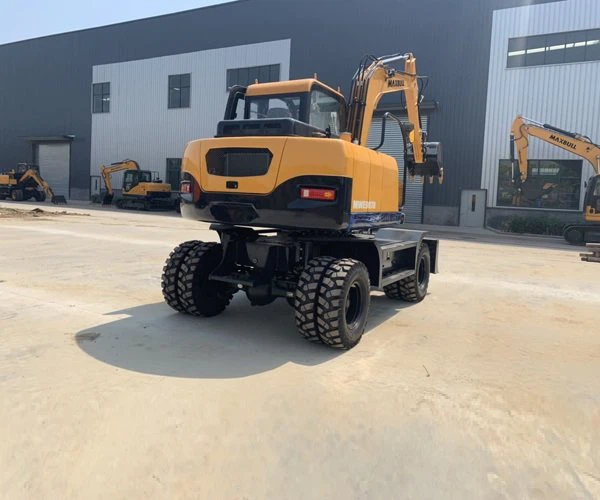 Позашляховий колісний екскаватор